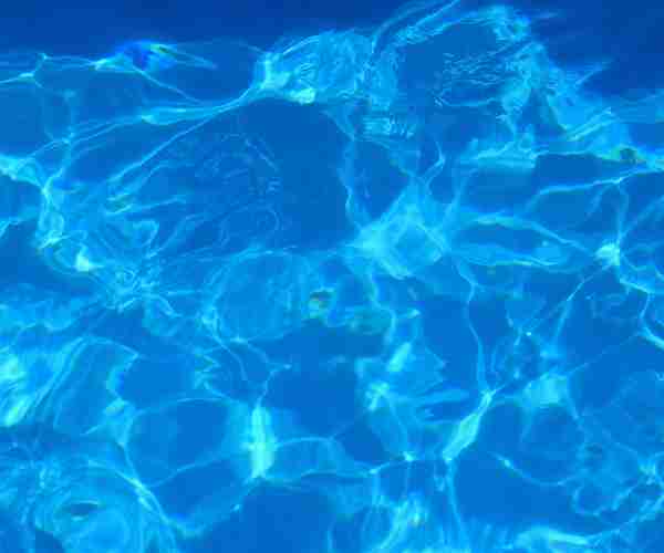 light-reflections-and-small-waves-in-pool-water-2022-02-16-08-17-23-utc.jpg